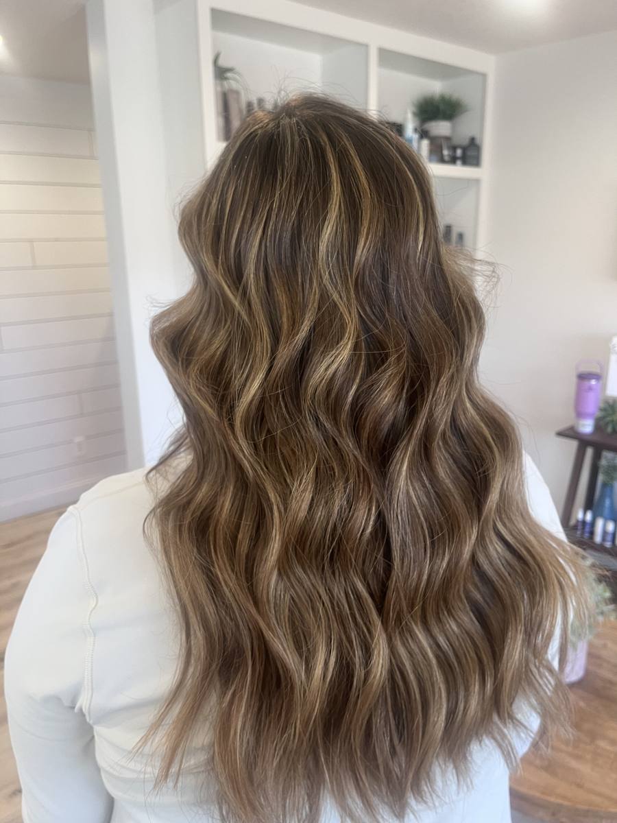 Caramel balayage on long waves