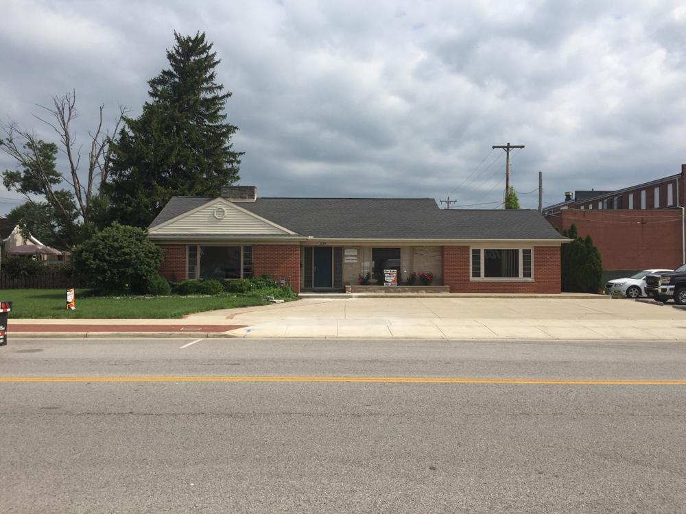 The vacant brick building at 234 E. 4th Street before renovation